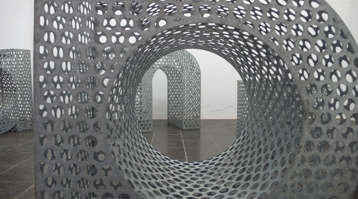 word sculpture made from perforated sheet metal
